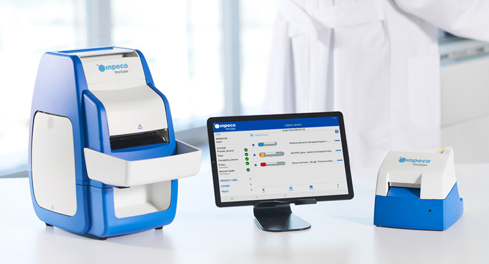ProTube Station   ProTube Station, Screen and label printer on a table within a clinical lab